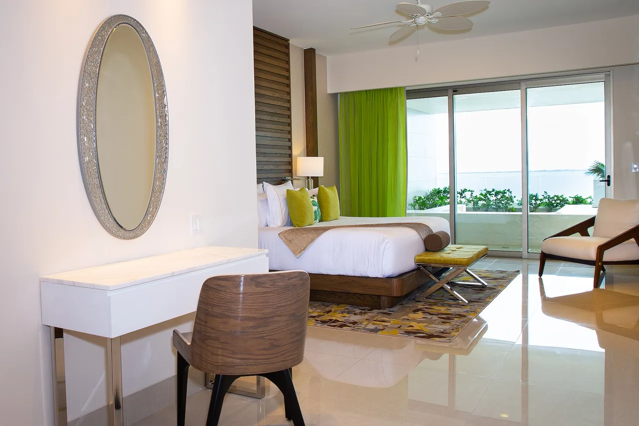 Bedroom with vanity and terrace view