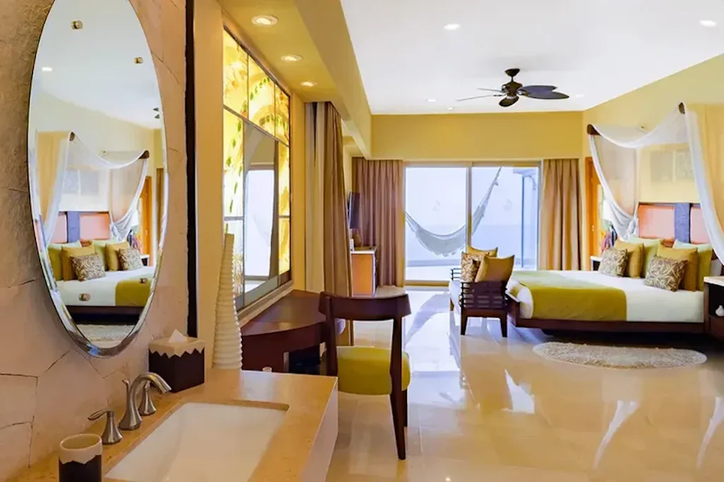Master suite with vanity and ocean-view windows