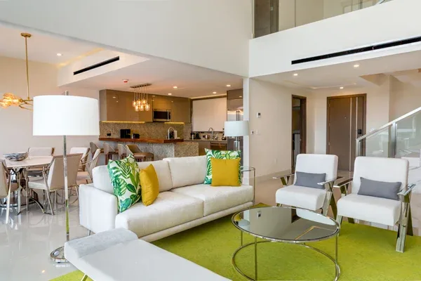 Split-level living room with floor-to-ceiling windows