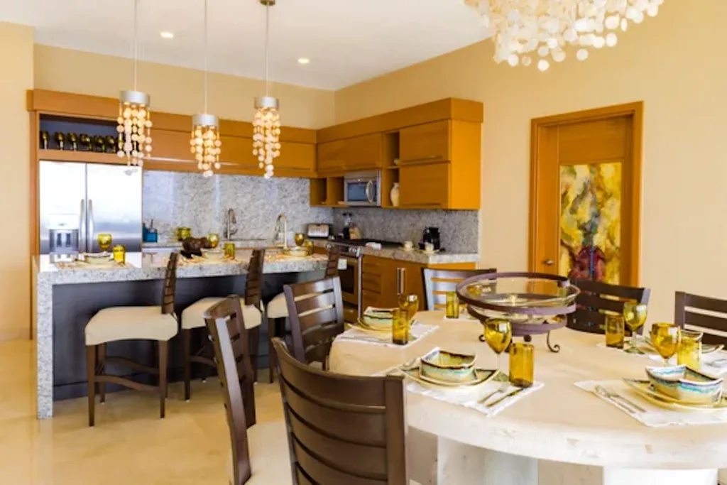 Gourmet kitchen with breakfast bar and dining table for eight